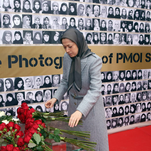 Maryam Rajavi lays flower on the memorial for martyrs