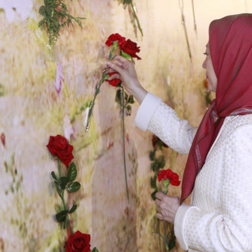 Laying flowers at the monument in memory of 30,000 victims of 1988 massacre, symbols of honor and resistance of the people of Iran