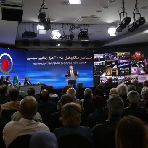 Mayor of Magny-en-Vexin Jean-Pierre Muller addresses the Iranian Communities’ global conference marking the 30th anniversary of the massacre of 30,000 political prisoners