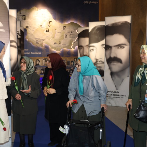 Maryam Rajavi accompanied by mothers of Iranian Resistance’s martyrs at the exhibition of the Iranian people’s 120 years of struggle for freedom – July 12, 2019