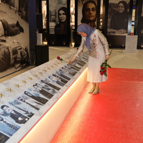 Visiting the exhibition of the Iranian people’s 120 years of struggle for freedom – standing by the images of martyrs of the massacre in Asharf - July 12, 2019