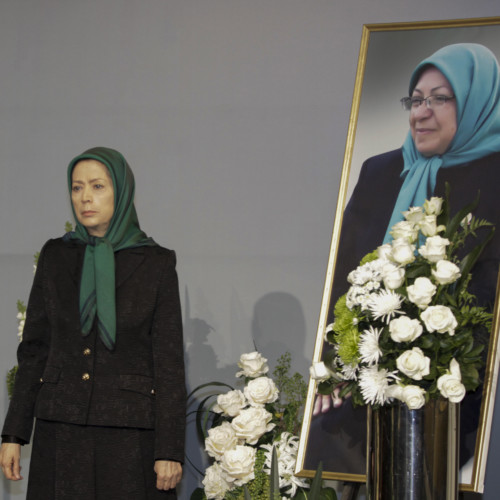 Putting flowers for Behnaz Mojalal, a member of PMOI who recently passed away