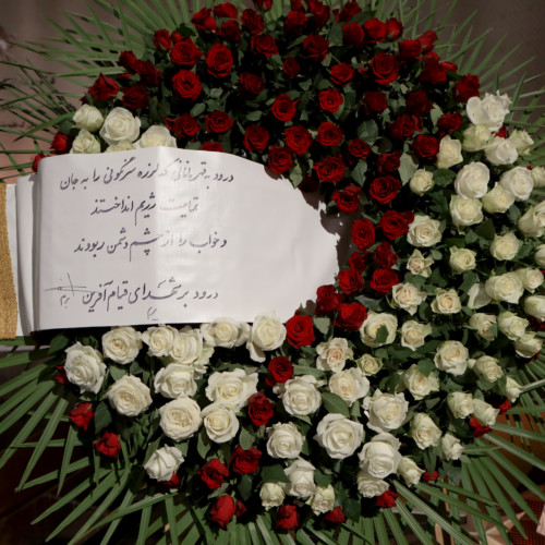 Putting flowers in the memory of November 2019 uprising