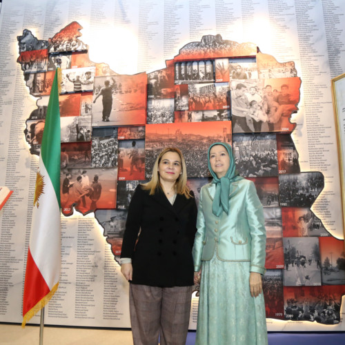 Monika Kryemadhi and Maryam Rajavi in front of the memorial of 120,000 members of the Iranian Resistance fallen for freedom and the list of PMOI martyrs