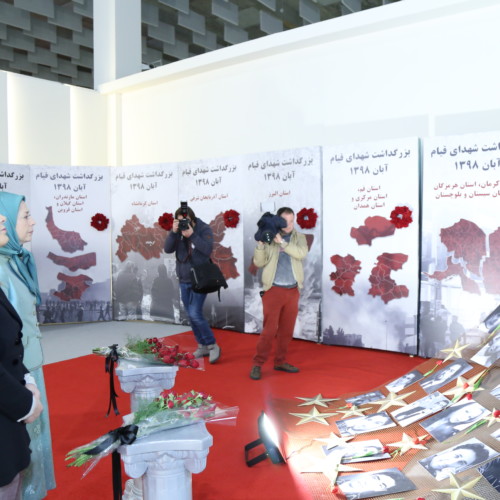 Maryam Rajavi, Monika Kryemadhi and her accompanying delegation visit the exhibition of 120 years of the Iranian people’s struggle for freedom - standing beside the memorial of 1,500 martyrs of the Iran Uprising in November 2019