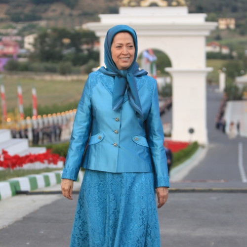 Maryam Rajavi standing in front of monument dedicated to Iran uprising and youth rising up against the mullahs’ dicatorship – Ashraf 3, July 17, 2020.