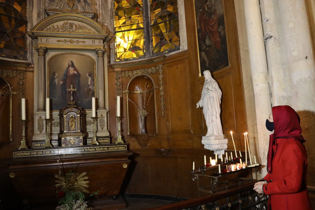 Attending the Christmas prayer service at the Pontoise Cathedral in Paris, France