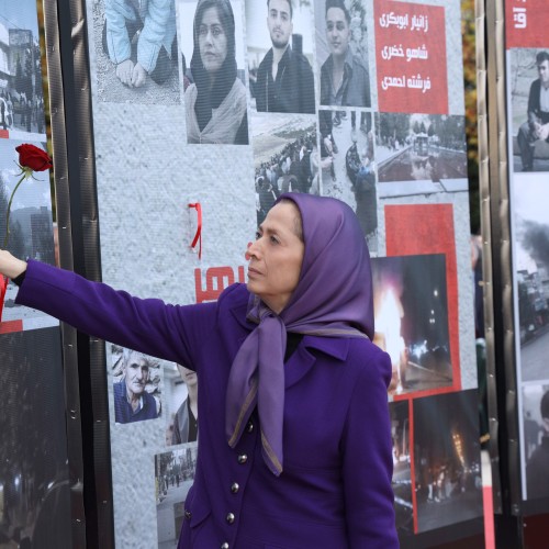 Standing by the image of Nasrin Qaderi, the brave Iranian women who was at the forefront of the struggle.