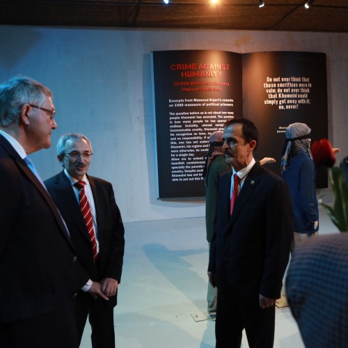 Franz-Josef Jung and Liam Fox tour the Resistance’s Museum during their visit to Ashraf-3