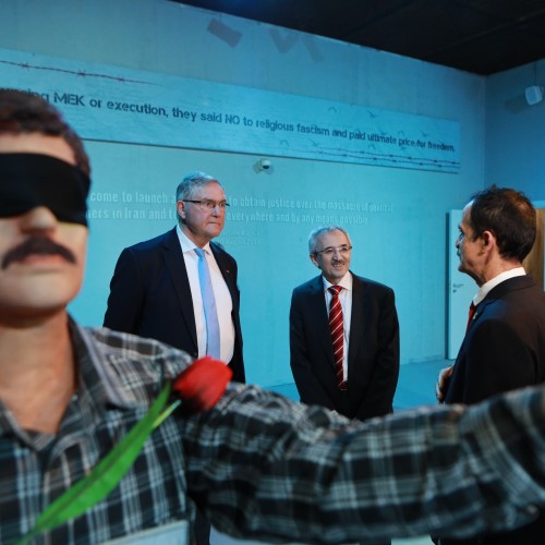 Franz-Josef Jung and Liam Fox tour the Resistance’s Museum during their visit to Ashraf-3