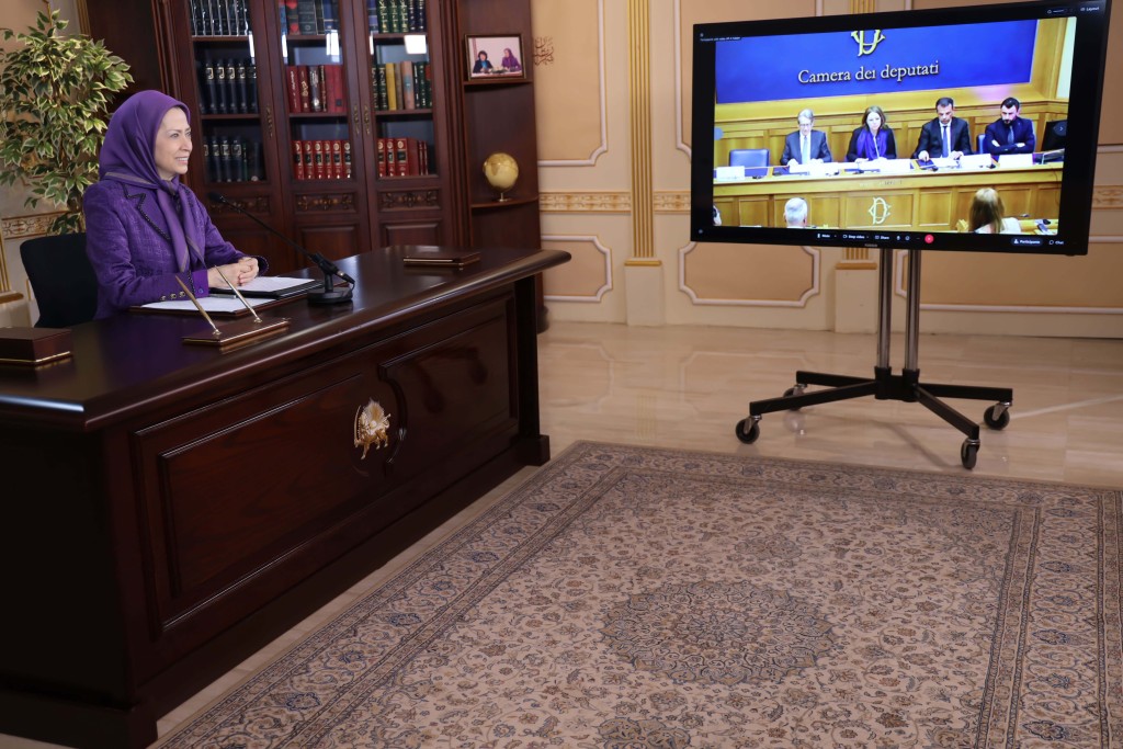 Addressing a conference at the Italian Parliament