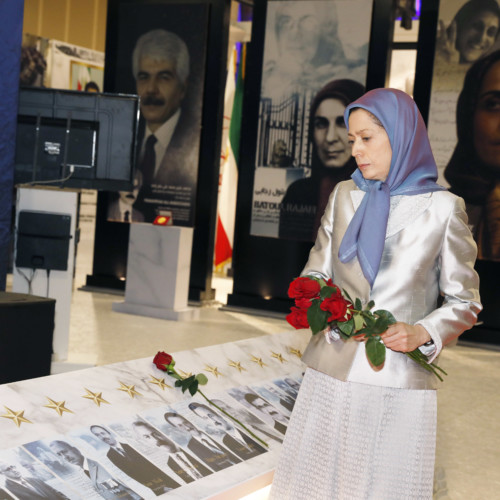 Visiting the exhibition of the Iranian people’s 120 years of struggle for freedom – standing by the images of martyrs of the massacre in Asharf - July 12, 2019