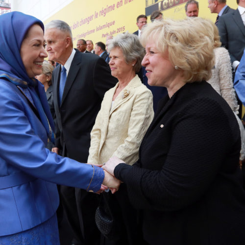 Maryam Rajavi, Iranian opposition leader talking to Mrs Kim Campbell at the grand annual gathering in Paris _56